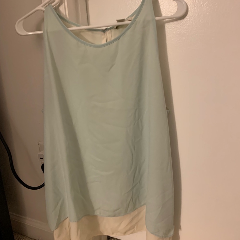Teal and cream layered sleeveless blouse
